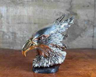 This lot features an impressive eagle bust sculpture, silver-plated and manufactured by Kkala out of Mexico. This bust measures, 11” H.