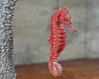 “Seahorse on Staghorn Coral”, an original limited edition sculpture by listed artist, Clarita Brinkerhoff. 6,252 pieces of Swarovski crystals, cast polished rhodium plated on a granite base. Edition 48/150, signed, and measures, 21.5” H x 11” W x 7.5” D.