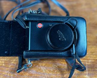 This lot features a Leica D-Lux 4, a classic 10.1-megapixel compact digital point-and-shoot camera released in 2008. It features a bright 24–60mm equivalent f/2.0–2.8 zoom lens, a 1/1.63-inch CCD sensor, and RAW image support.