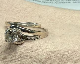 This lot features a stunning 14k gold & natural diamond wedding ring and band. Total approx. weight of 7.49 grams and come in a size 7. Purchased from Shane Jewelers in 2018 and comes with an appraisal for the 1.33 carat natural diamond as shown in photos. $6,400 valued appraisal from 2018 for both rings.