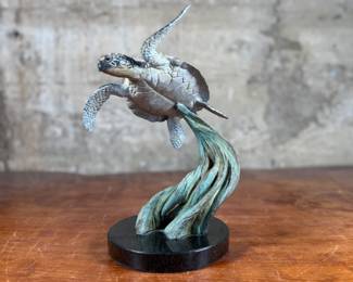 “Ancient Mariner”, an original limited edition bronze sculpture by listed artist, Robert Wyland. Signed with edition in photos. This bronze sculpture measures, 10.5” H.