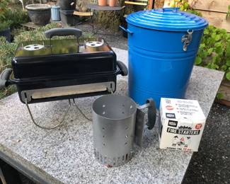 Small Weber grill, spiffy blue metal trash can