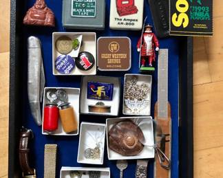 Case items: Skagen & Hamilton watches, sterling salt spoons, Keith Haring pin & pendant, 1993 Sonics playoff tickets, Hamilton & Skagen watches, sterling salt spoons, advertising tape measures