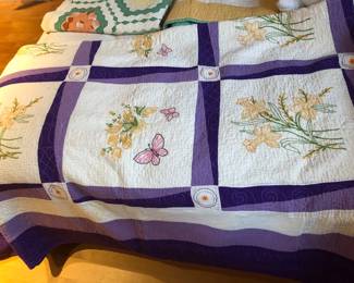 Quilt with embroidered flowers & butterflies (86” square)