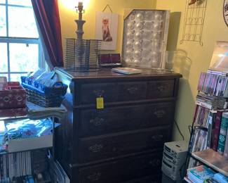 chest of drawers, tree sculpture, records, holiday items, etc.