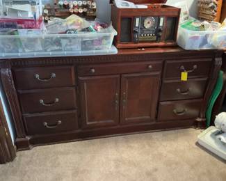 sewing items, tabletop wooden radio, etc.