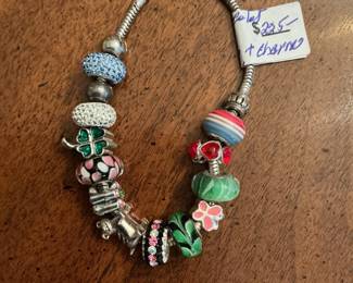 925 bracelet with some Pandora charms