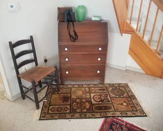 Writing desk; rush seat chair; binoculars