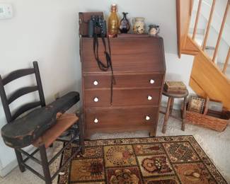 Writing desk; rush seat chair; binoculars