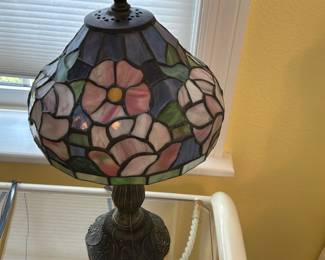 There are a lot of stained glass lamps