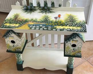 Handmade table with birdhouses