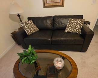 Oval Mahogany coffee table with glass top