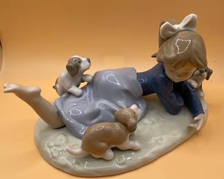 Lladro Figurine "New Playmates" (Boy with Puppies)