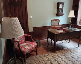 floral arm chairs, wooden office desk, Coach office supplies