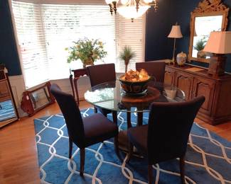 round glass top dining table with 4 chairs, area rug, Kindle buffet, Bombay Co. expanding hall table, ornate mirror, Ballard vase, table lamps