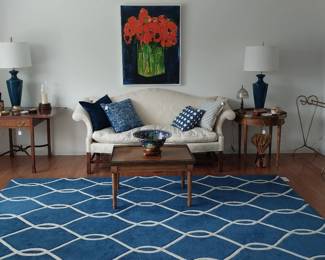 area rug, quilt rack,Baker Furniture sofa, deep arm chair with ottoman, coffee table, side table, Kindle drop leaf side table, table lamps, wall art