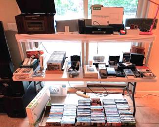 Wii fit board, Intech workout kit, White Wii sports edition, EA sports Wii active personal trainer, dash cam, video door bell, simply safe camera, Fitbits, Motorola walkie-talkie, Bose radio, Bose sound dock for Ipod, portable DVD player, emergency radio, Kodak ez share, PS 2 games, DVD’s, vinyl records