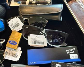 (A) Ray Ban Sunglasses, Ford Zippo Lighter, (B) Ray Ban Sunglasses 