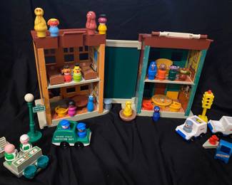 vintage 1974 Fisher-Price Play Family Sesame Street (#938) playset featuring a foldable apartment building and store