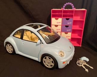 vintage 2000 Mattel Barbie Volkswagen Beetle in light blue, featuring a sunroof and a distinct Volkswagen logo on the wheels