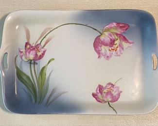 antique ceramic serving tray features hand-painted pink tulips with green foliage