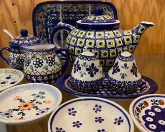 collection features Blue Rose Polish Pottery in the "Flowering Peacock" pattern