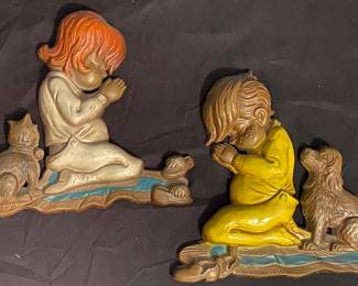 vintage 1970s Sexton metal wall plaques featuring praying children with pets