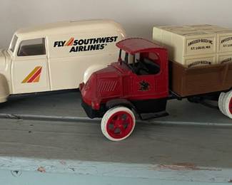 vintage Ertl die-cast metal toy truck banks, likely featuring a 1926-style Mack Bulldog