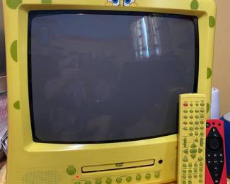 yellow SpongeBob SquarePants 13-inch CRT television features green polka dots, a built-in DVD player, and character logos on top