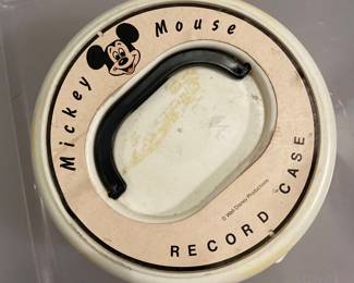 a vintage 1950s-70s white plastic Mickey Mouse 45 RPM record case featuring the "Walt Disney Productions" logo