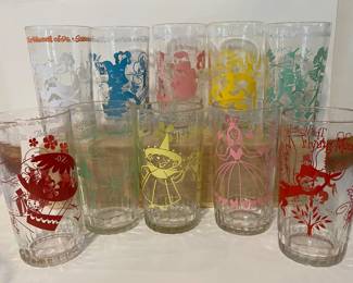 collection features vintage The Wizard of Oz promotional drinking glasses originally sold containing Swift's Peanut Butter.
