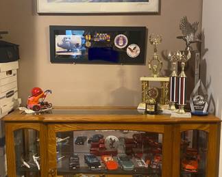 Wood/glass display cabinet & trophy collection
