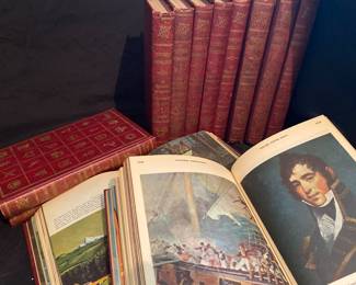 a set of vintage Picturing Knowledge history books with red bindings and gold-leaf lettering