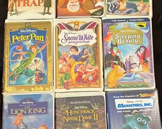 a collection of vintage Disney Black Diamond and classic family clamshell VHS tapes, primarily released in the late 1980s and 1990s