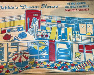 Debbie's Dream House, a highly sought-after, mid-century modern dollhouse manufactured by the De Luxe Reading Corporation (De Luxe Toys) in 1963