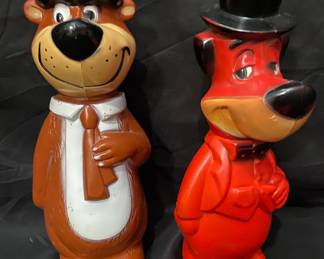vintage 1960s Hanna-Barbera plastic coin banks, manufactured by Knickerbocker, featuring Yogi Bear and Huckleberry Hound