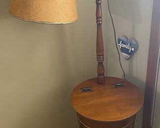 intage 1970s floor lamp features a maple wood sewing basket barrel base, three legs, and a burlap shade