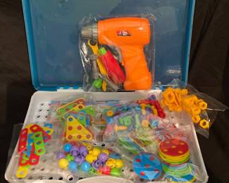 CHHELIHL brand puzzle kit includes 239 pieces for building 2D and 3D models.The set features a working electric drill that rotates like a real tool
