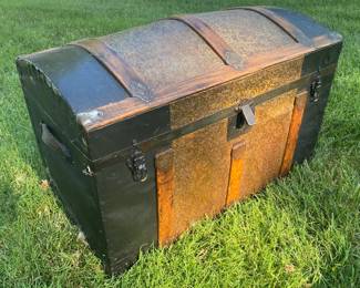 Antique camel-back trunk