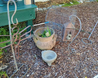 Lot 91: Outdoor garden decor: lantern, bird cage, metal cross and planters