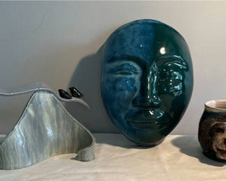 Lot 52: Ceramic art collection: blue-green face sculpture, monkey-mug, and abstract forms