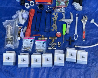 Lot 68: Assorted plumbing hardware, fittings, and installation tools