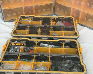 Lot 54: DeWalt multi-compartment tool storage case with hardware and abrasives