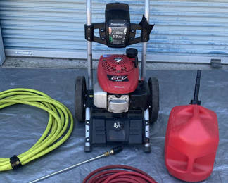 Lot 5: PowerStroke gas-powered pressure washer with hoses and attachments