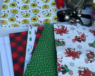 Lot 84: Assorted Christmas gift wrap, boxes, and holiday decor