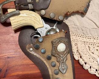 1950s toy cap, gun holster, and belt