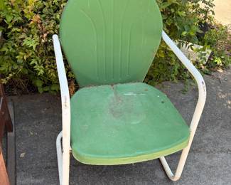 We have two of these lime green vintage hotel chairs