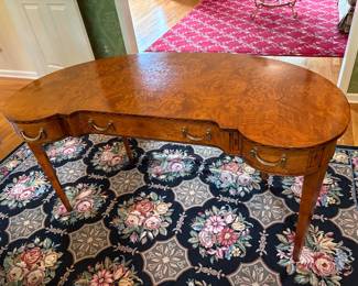antique-style mahogany kidney-shaped desk