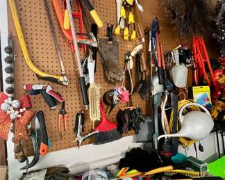 Stocked garage full of various power tools, yard equipment, decor and more!