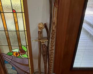 Collection of Three Decorative Walking Sticks/Canes, including a Lion's Head Cane